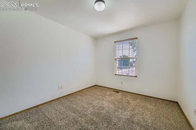 a workspace with furniture window and wooden floor
