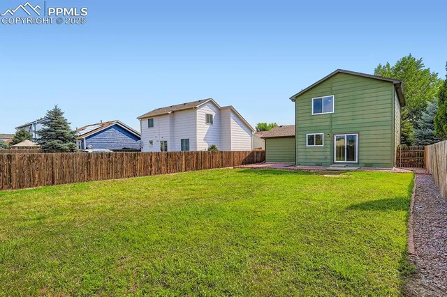 a house view with a garden space
