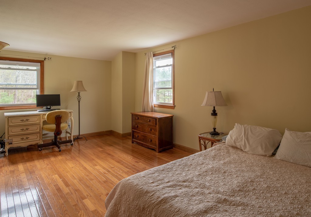 960 Westhampton Road Northampton, MA 01062 - Photo 11 of 16 a bedroom with a bed and a window