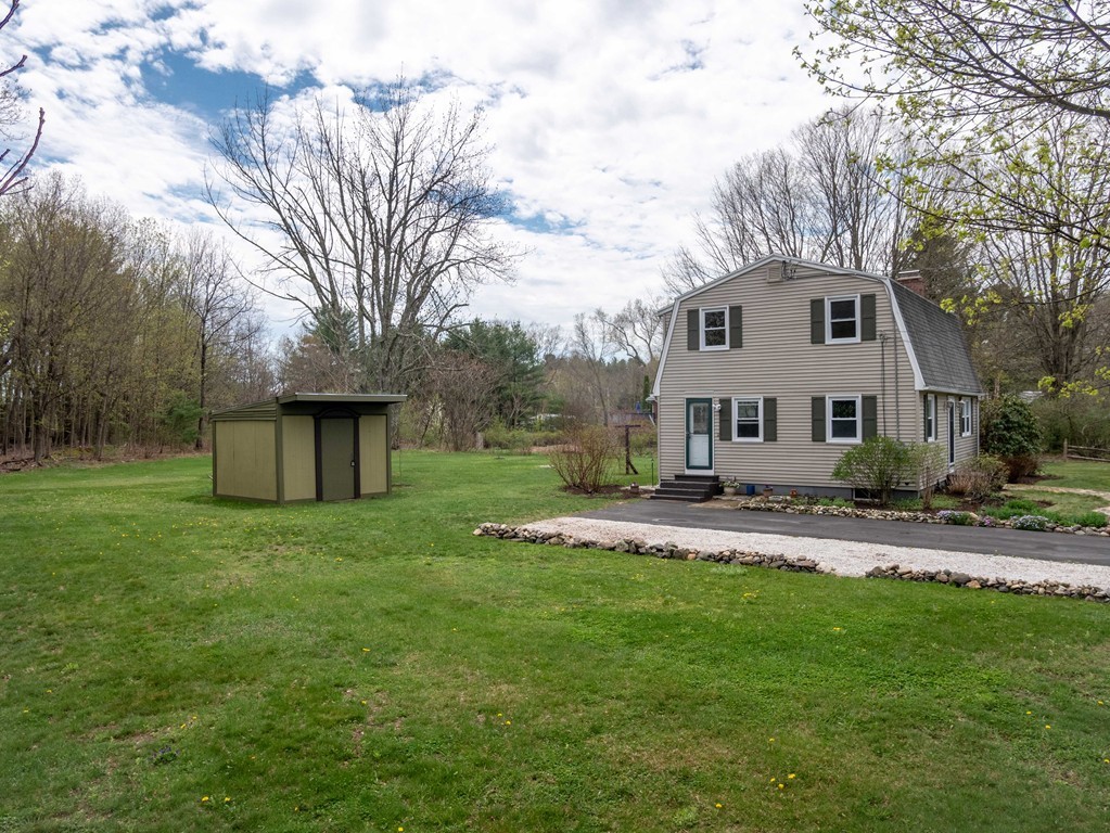 960 Westhampton Road Northampton, MA 01062 - Photo 13 of 16 a front view of a house with a yard