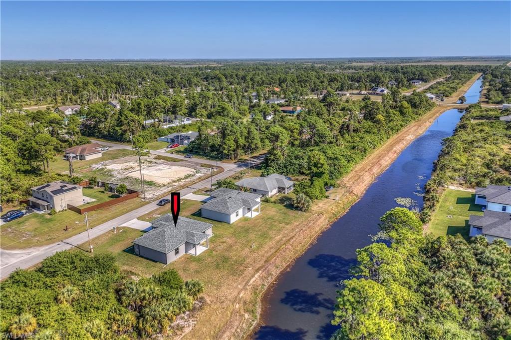 1132 Cumming Street East Lehigh Acres, FL 33974 - Photo 36 of 39 a view of a lake with outdoor space