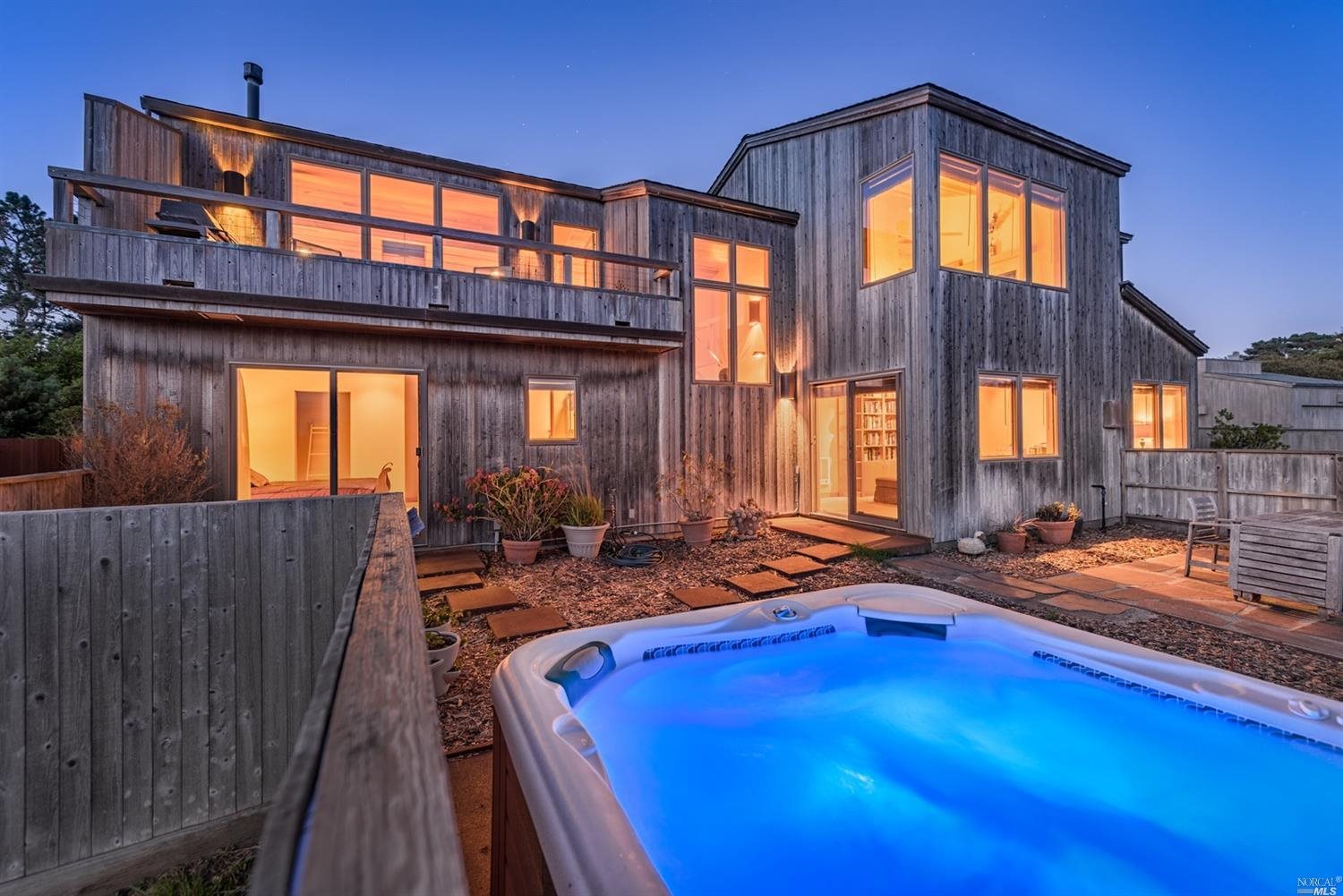 41278 Leeward Road The Sea Ranch, CA 95497 - Photo 1 of 1 Hot tub and courtyard at twilight