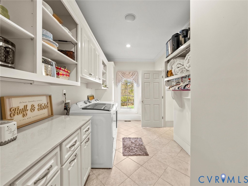 24200 Pear Orchard Road Moseley, VA 23120 - Photo 62 of 66 Large laundry room with custom shelving and built-