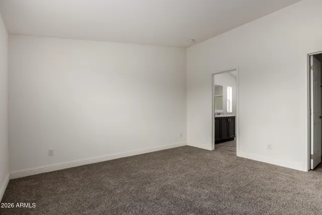 a bathroom with a granite countertop sink mirror and double
