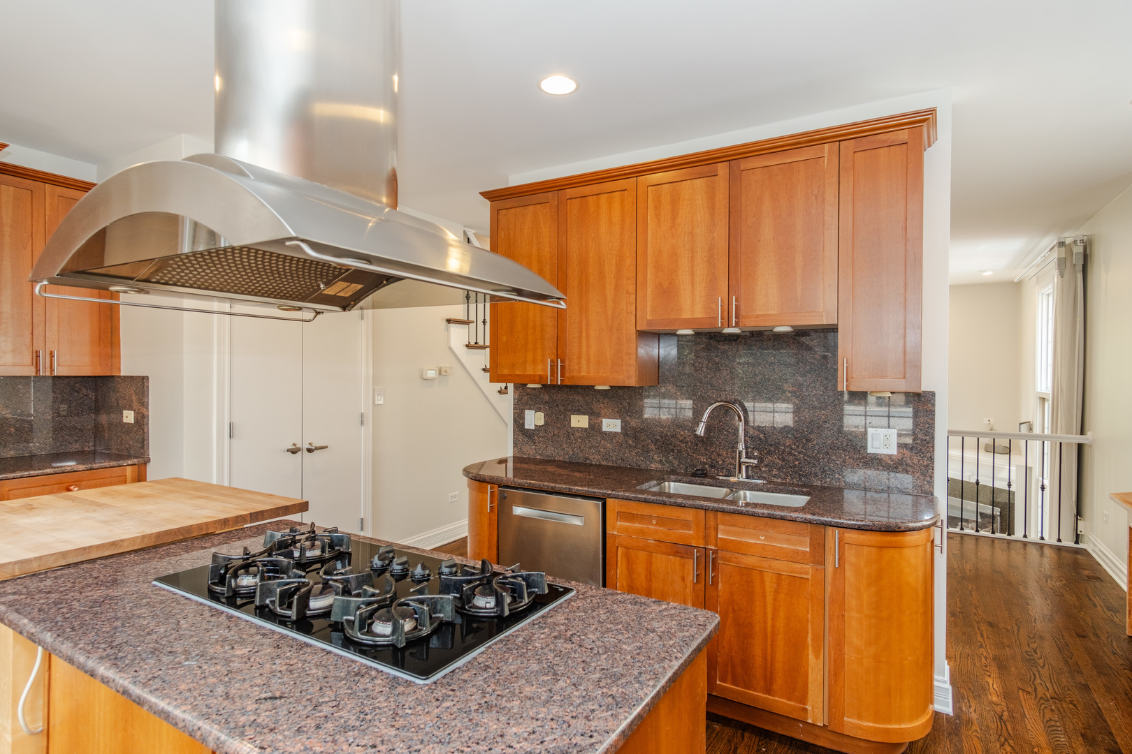 24 North Ada Street, Unit I Chicago, IL 60607 - Photo 11 of 29 a kitchen with stainless steel appliances granite countertop a sink stove and refrigerator