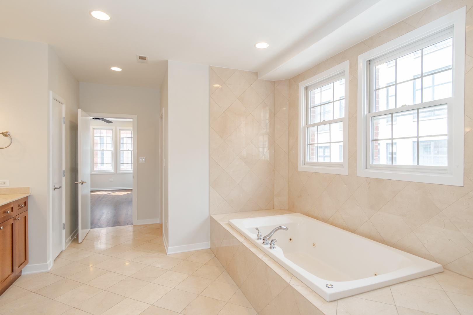 24 North Ada Street, Unit I Chicago, IL 60607 - Photo 21 of 29 a bathroom with a bathtub and a shower