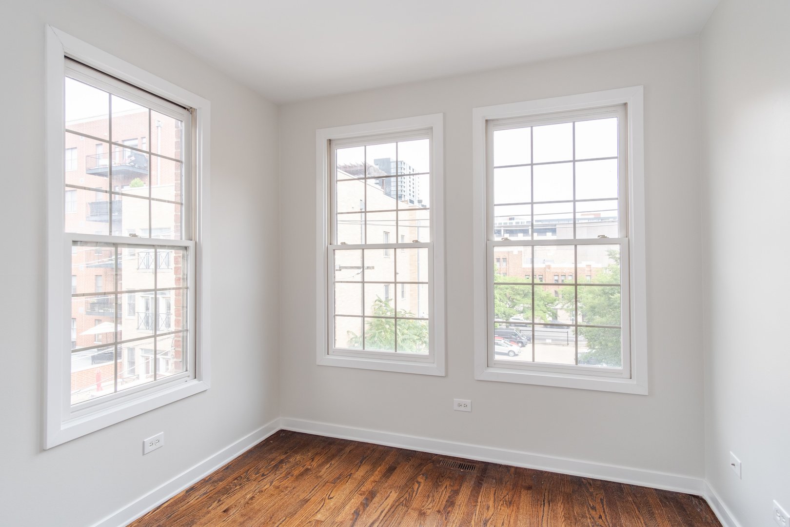 24 North Ada Street, Unit I Chicago, IL 60607 - Photo 24 of 29 an empty room with wooden floor