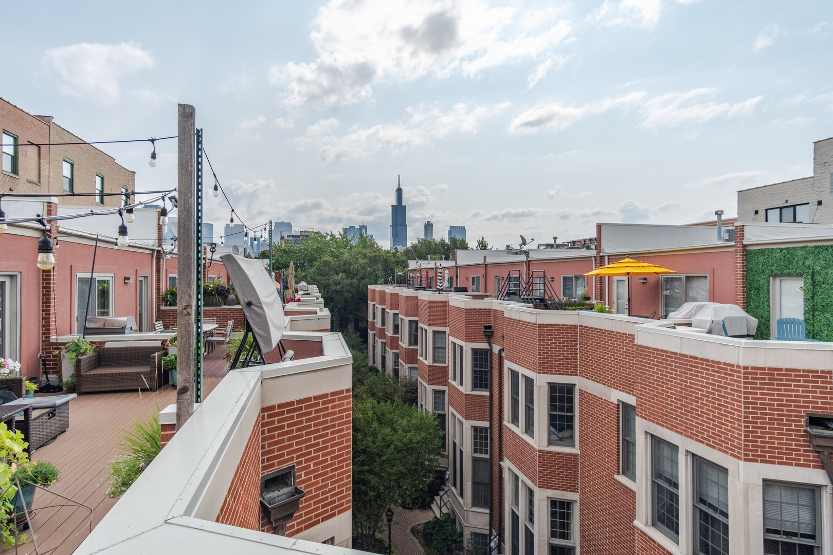 24 North Ada Street, Unit I Chicago, IL 60607 - Photo 26 of 29 a view of a city from a balcony