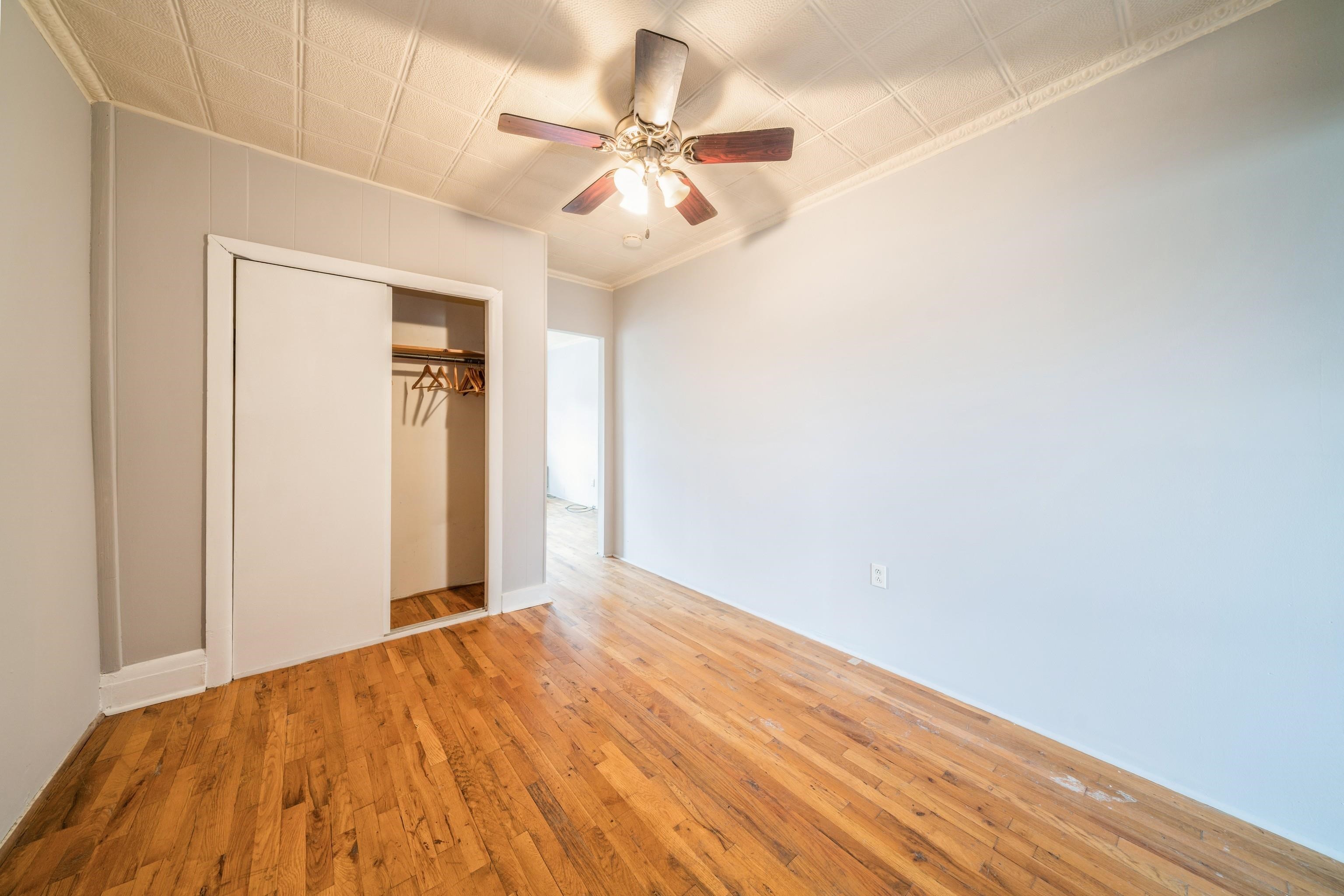 407 4th Street, Unit 4R (6) Hoboken, NJ 07030 - Photo 11 of 17 a view of a big room with wooden floor