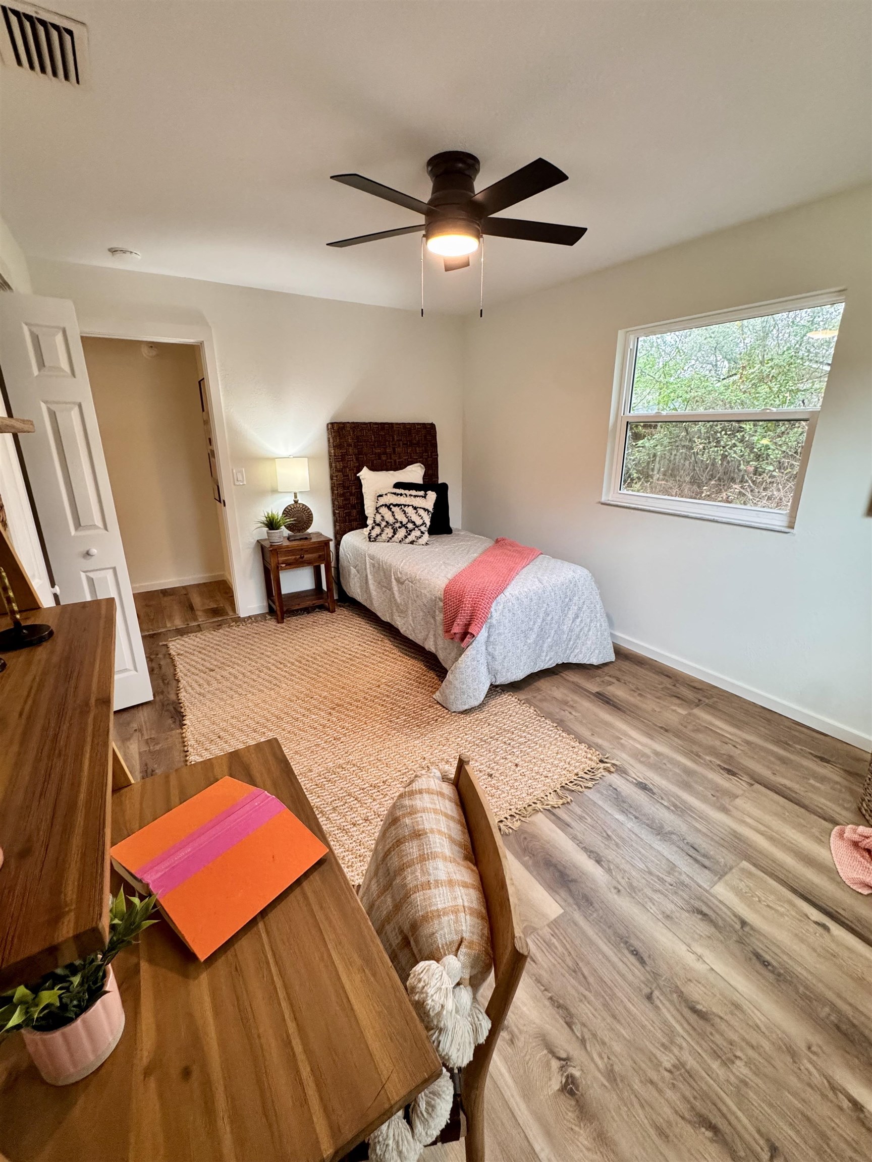 226 Jasmine Road St. Augustine, FL 32086 - Photo 15 of 20 a bedroom with a bed and wooden floor