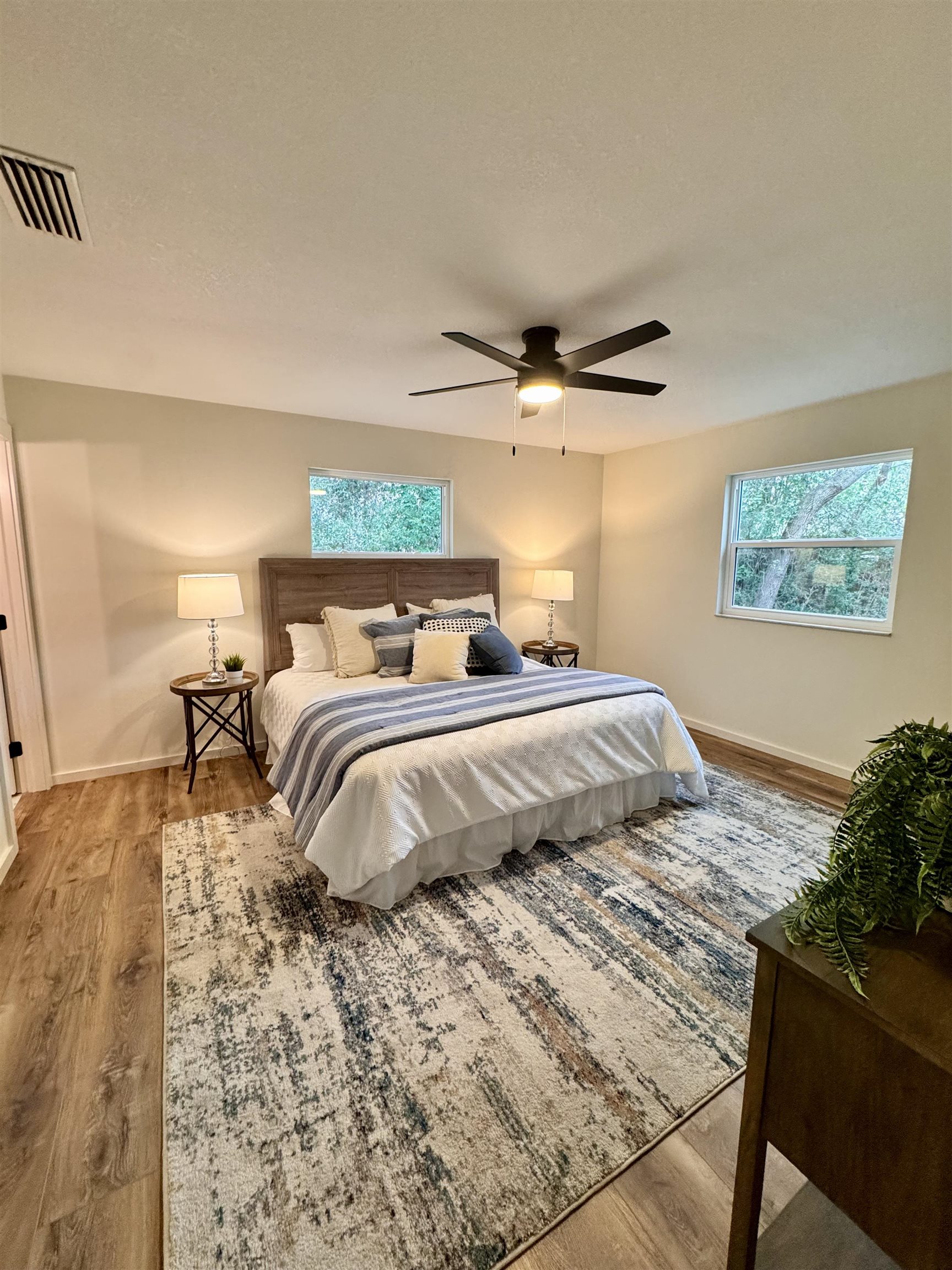 226 Jasmine Road St. Augustine, FL 32086 - Photo 18 of 20 a bedroom with a bed and a ceiling fan
