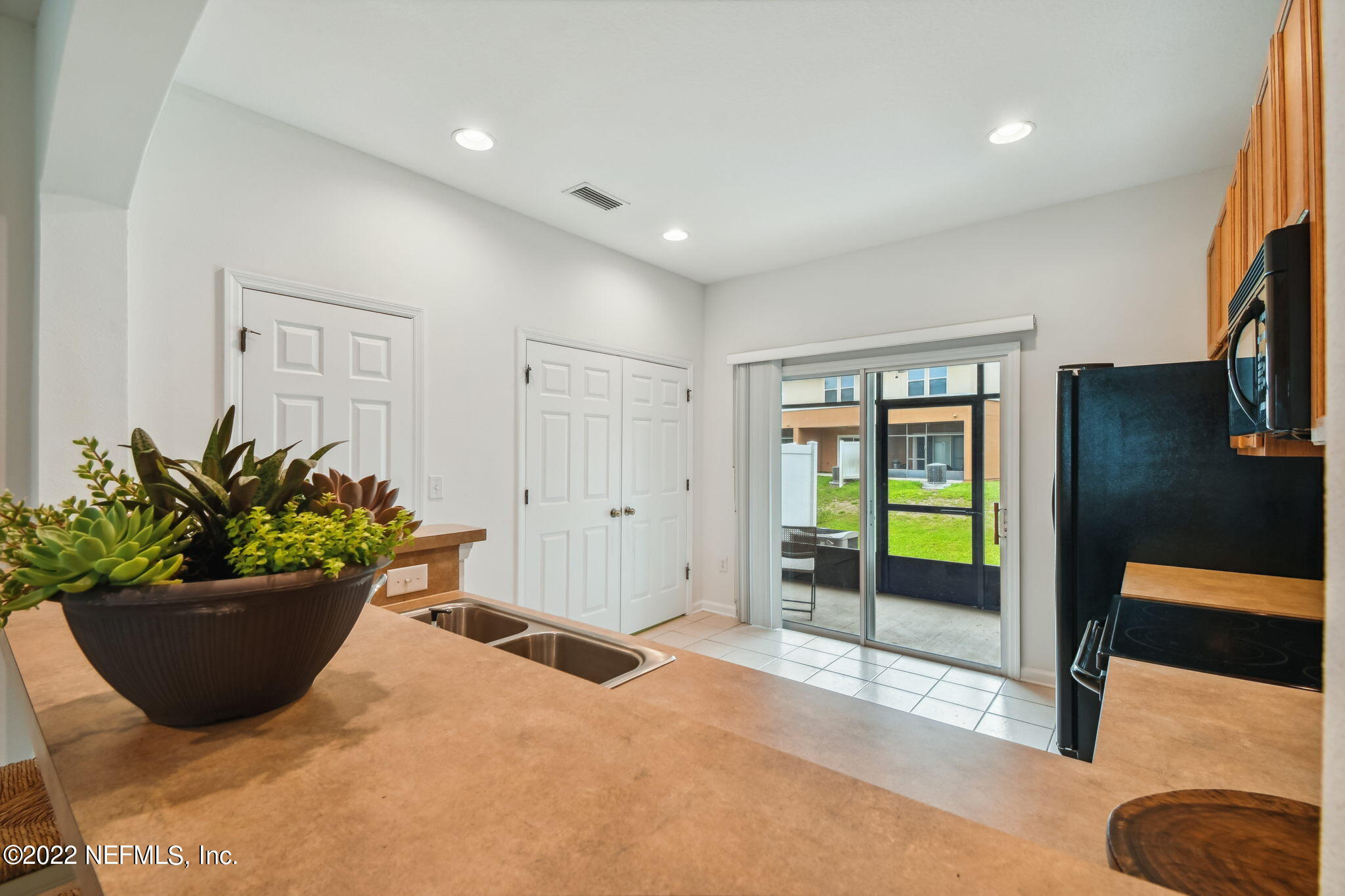 13063 Shallowater Road Jacksonville, FL 32258 - Photo 14 of 57 View to Screened Lanai