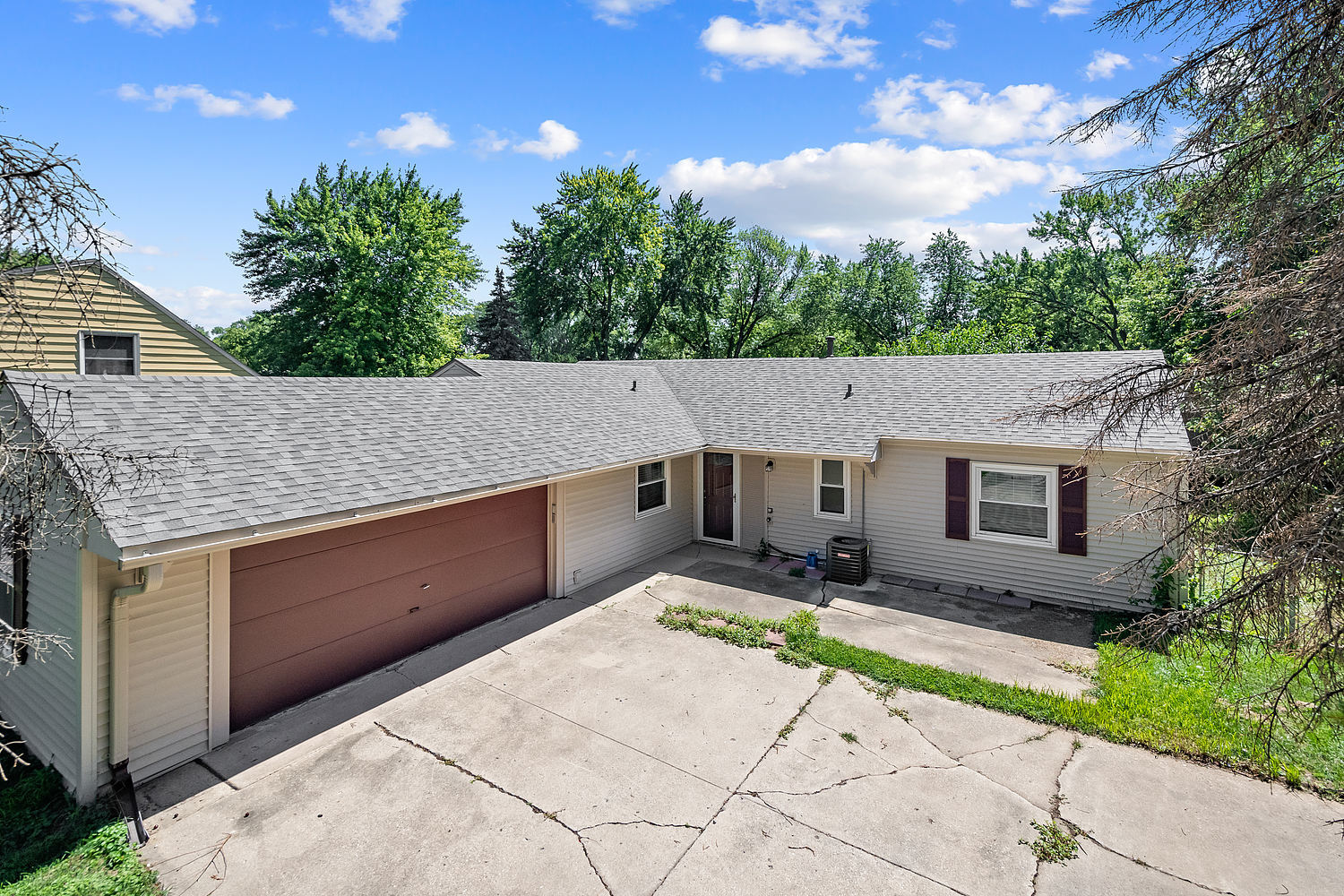 135 Thornhurst Road Bolingbrook, IL 60440 - Photo 1 of 15 a backyard of a house with large trees and outdoor seating