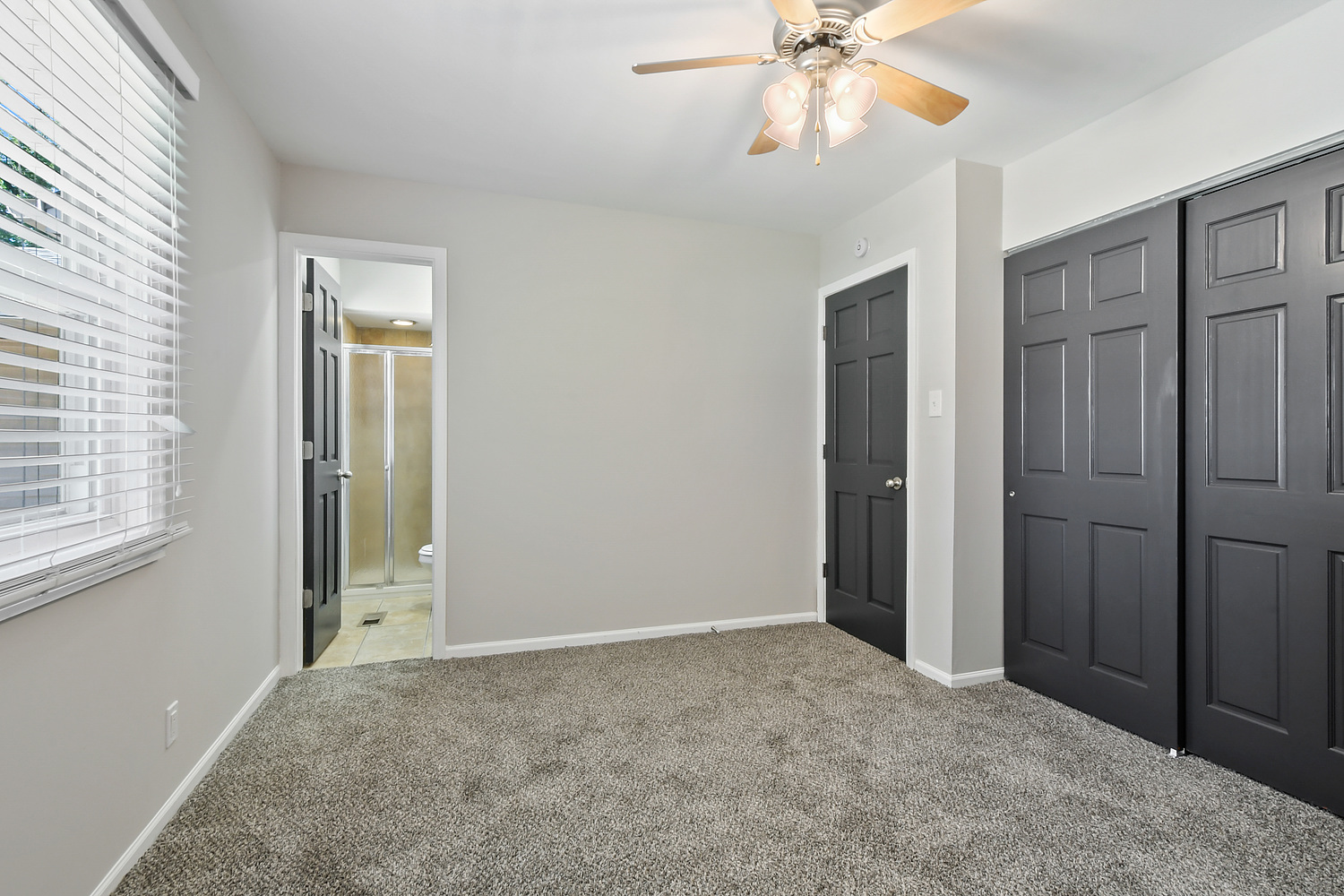 135 Thornhurst Road Bolingbrook, IL 60440 - Photo 11 of 15 an empty room with fan and windows