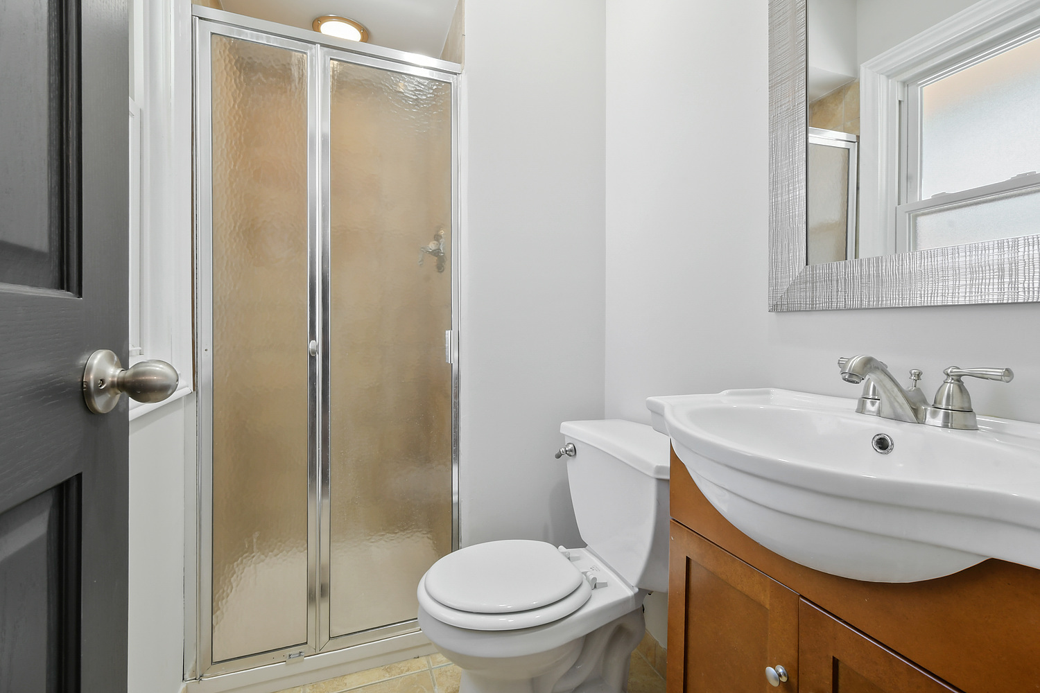 135 Thornhurst Road Bolingbrook, IL 60440 - Photo 12 of 15 a bathroom with a sink a toilet and shower
