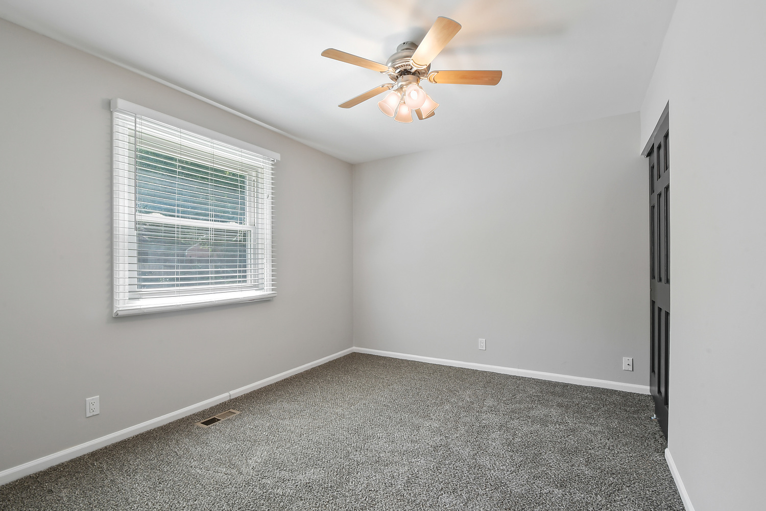 135 Thornhurst Road Bolingbrook, IL 60440 - Photo 14 of 15 an empty room with a window and a fan