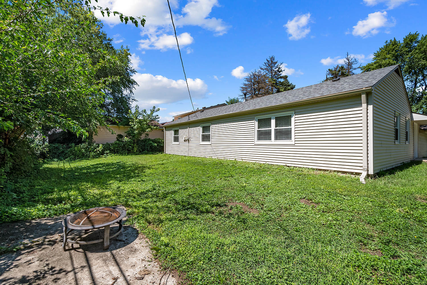 135 Thornhurst Road Bolingbrook, IL 60440 - Photo 4 of 15 a house view with a garden space