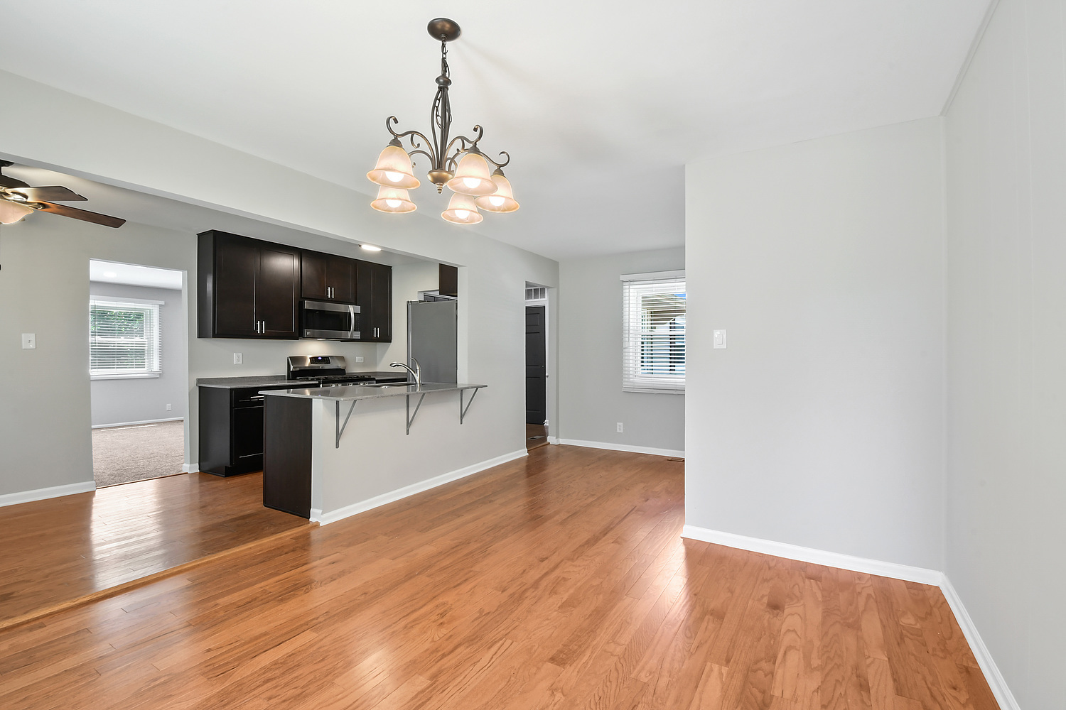 135 Thornhurst Road Bolingbrook, IL 60440 - Photo 5 of 15 a view of a kitchen with microwave and stove