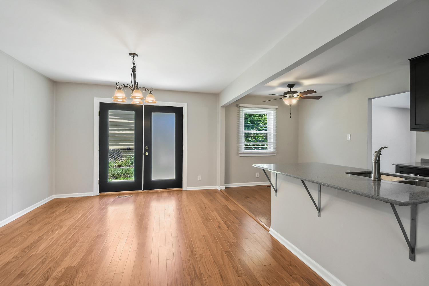 135 Thornhurst Road Bolingbrook, IL 60440 - Photo 7 of 15 a view of empty room with wooden floor and fan