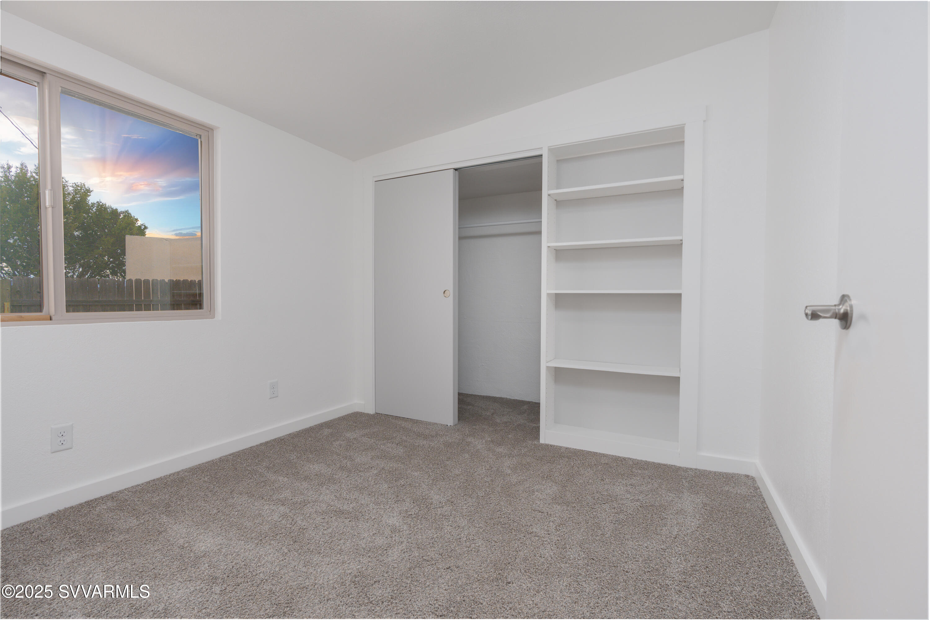 4875 East Mallard Drive Rimrock, AZ 86335 - Photo 13 of 36 a view of an empty room with a closet