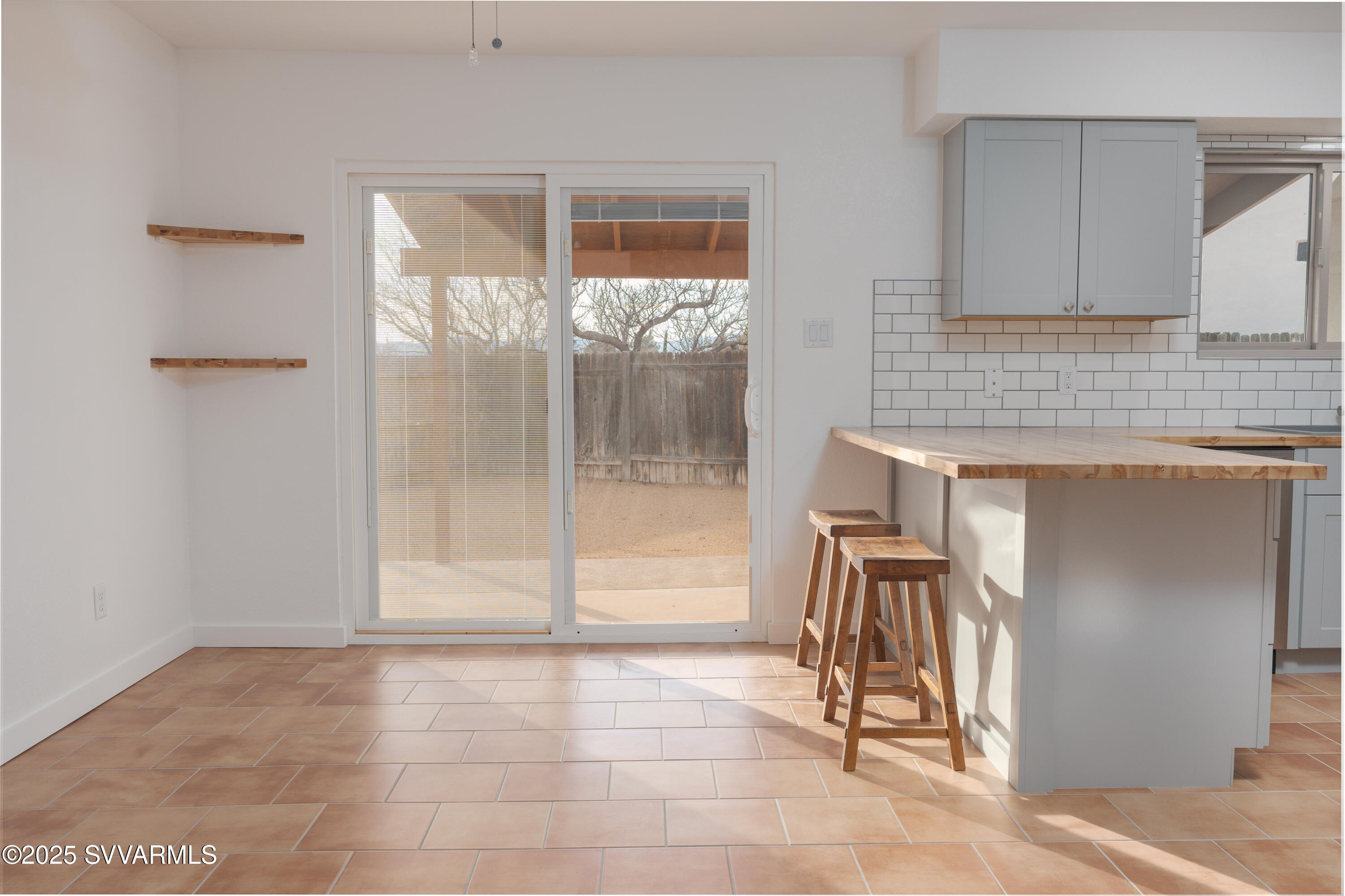 4875 East Mallard Drive Rimrock, AZ 86335 - Photo 18 of 36 a view of a kitchen with furniture and a window