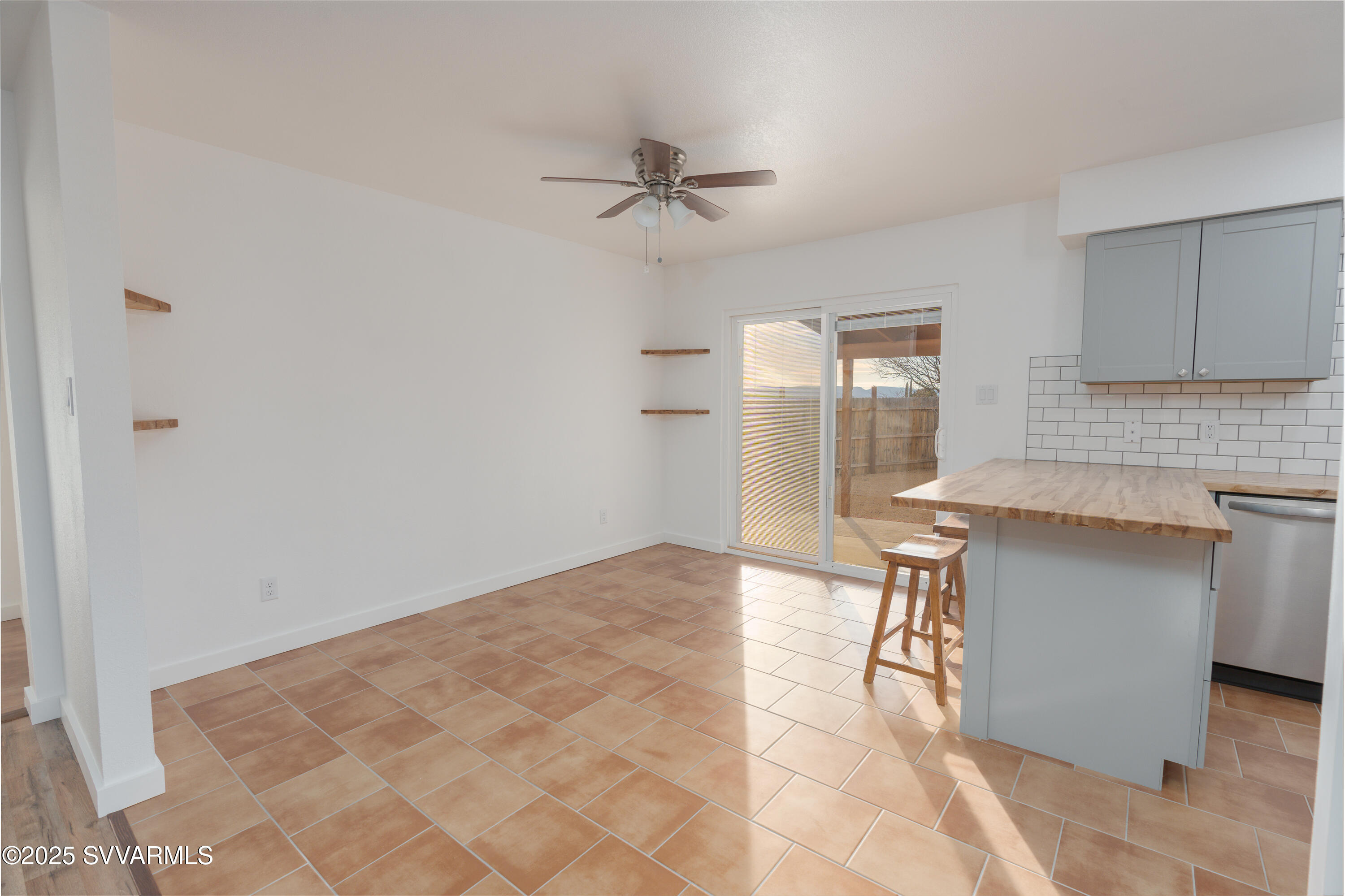 4875 East Mallard Drive Rimrock, AZ 86335 - Photo 19 of 36 a view of a kitchen with a sink and cabinets