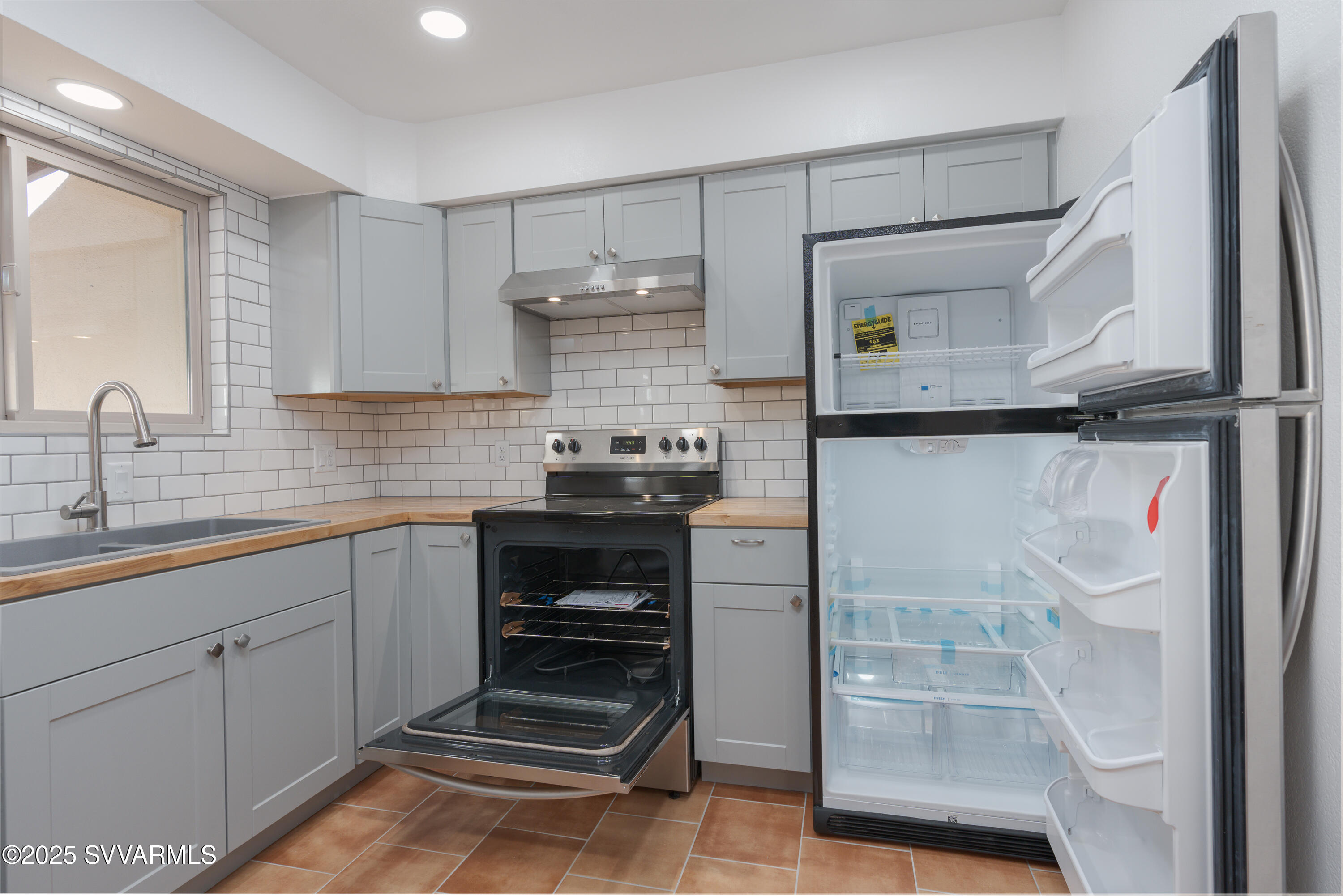 4875 East Mallard Drive Rimrock, AZ 86335 - Photo 23 of 36 a kitchen with a sink and cabinets