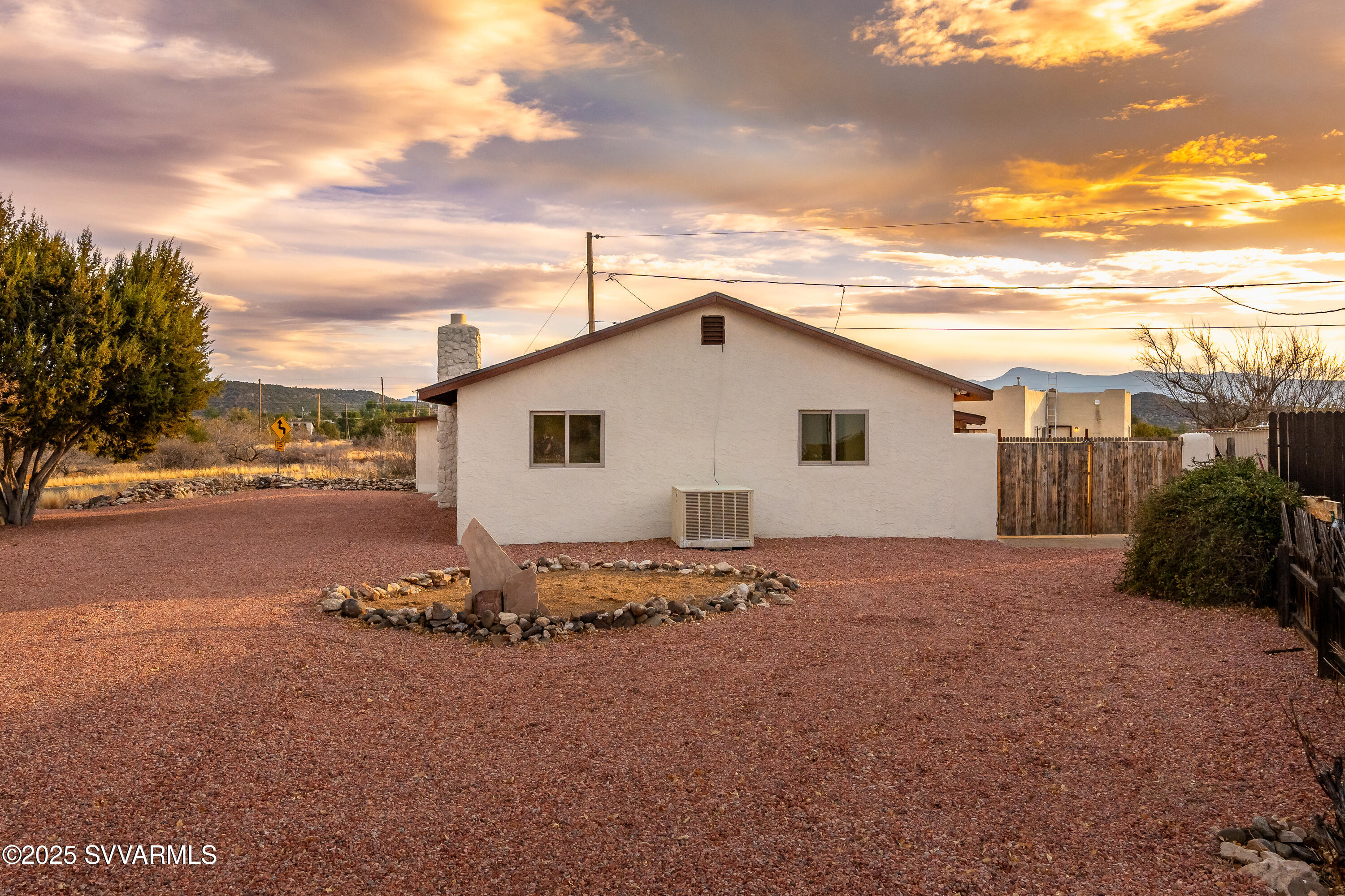 4875 East Mallard Drive Rimrock, AZ 86335 - Photo 32 of 36 a view of a backyard with large trees