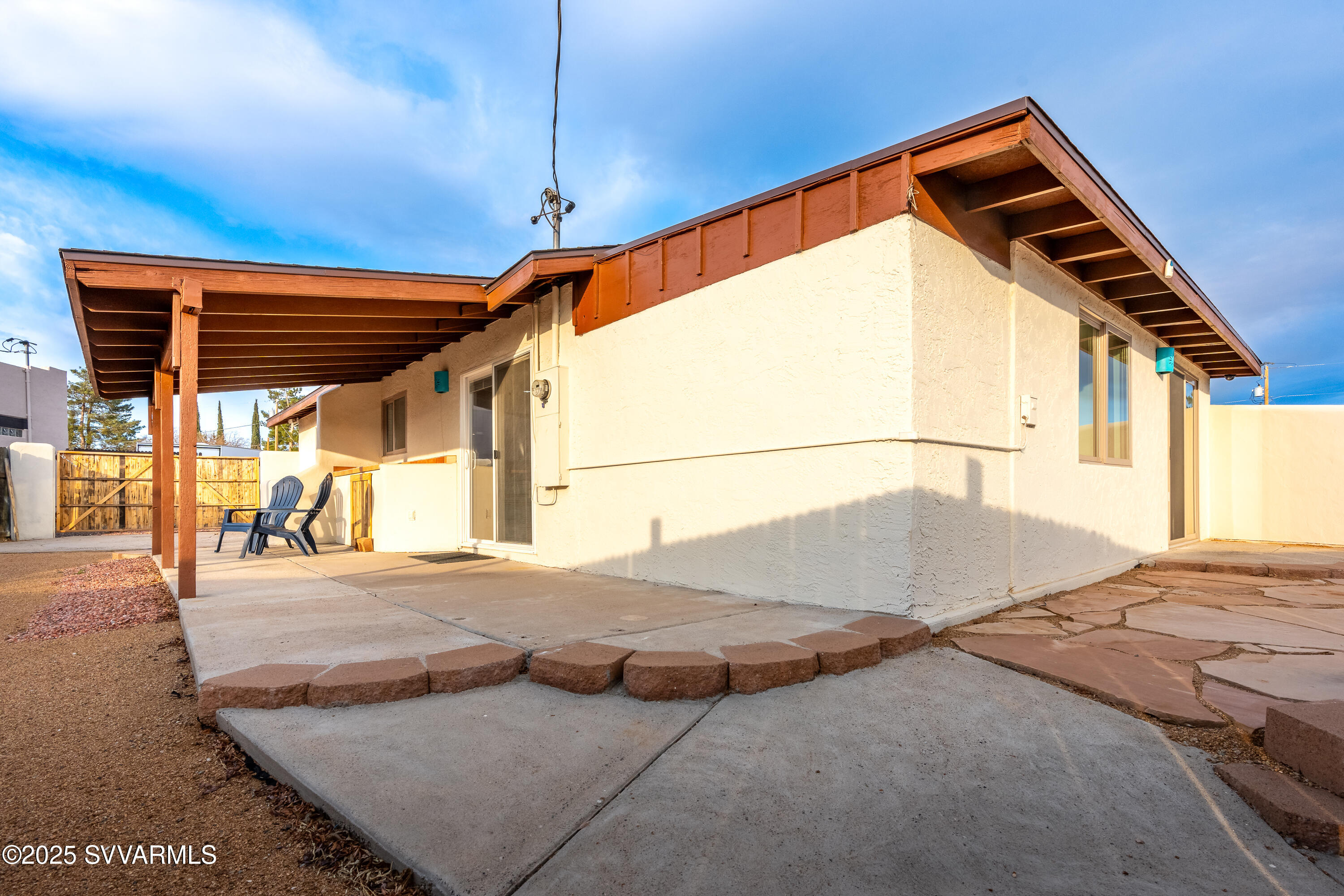 4875 East Mallard Drive Rimrock, AZ 86335 - Photo 34 of 36 a bedroom with a bed and window