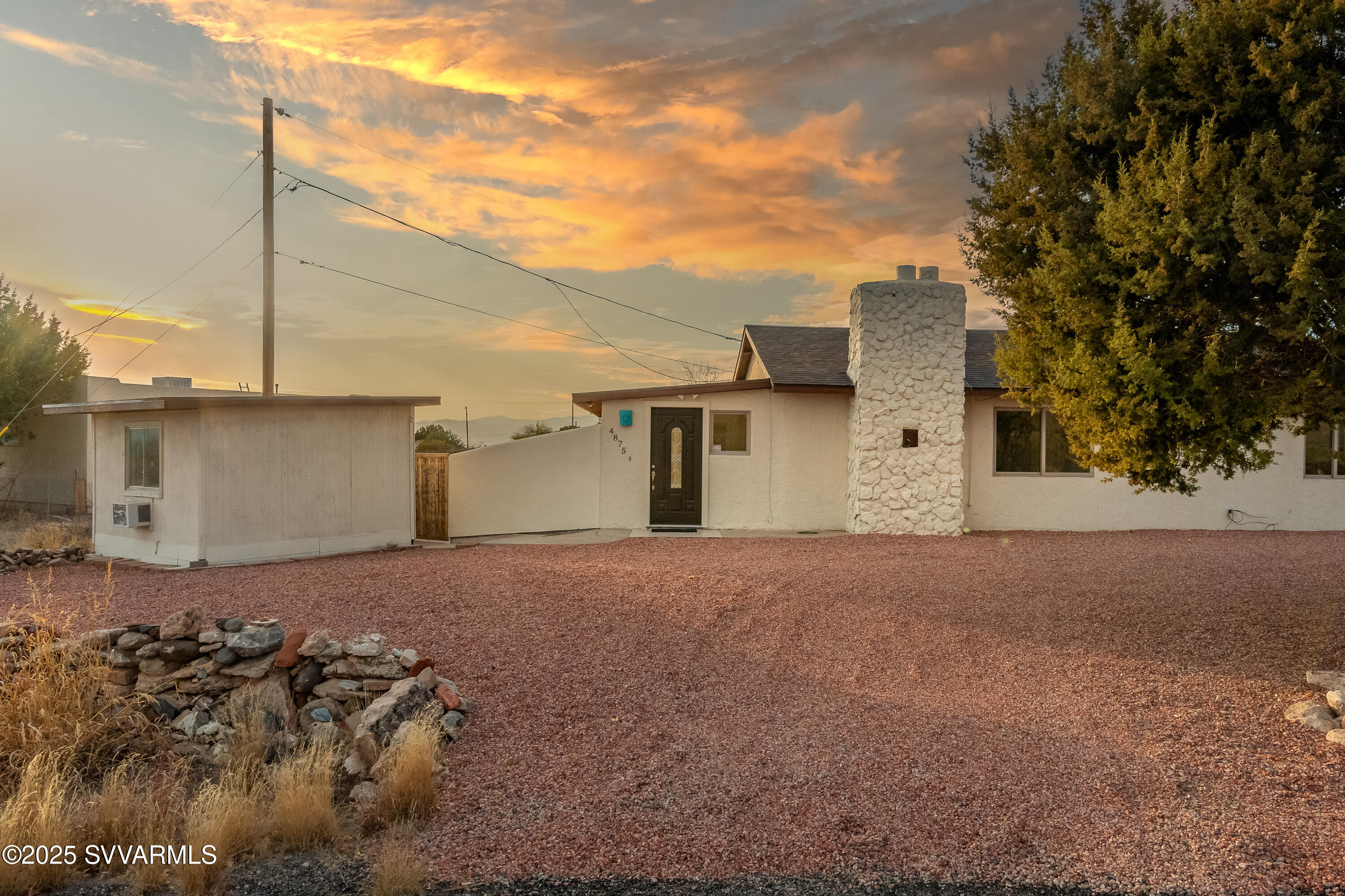 4875 East Mallard Drive Rimrock, AZ 86335 - Photo 9 of 36 a front view of a house with a yard