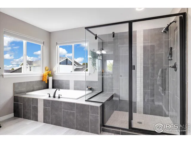 a kitchen with a sink and a mirror