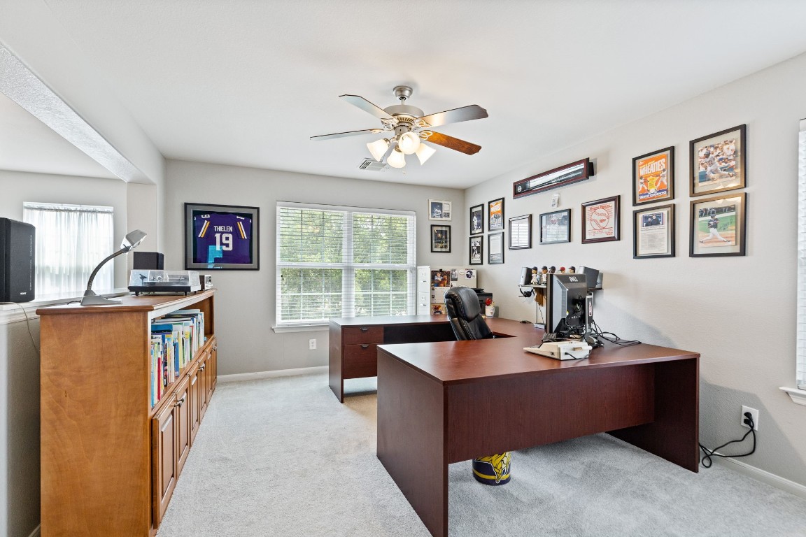 5318 Wisteria Brook Lane Spring, TX 77379 - Photo 27 of 50 a view of a workspace with furniture and a window