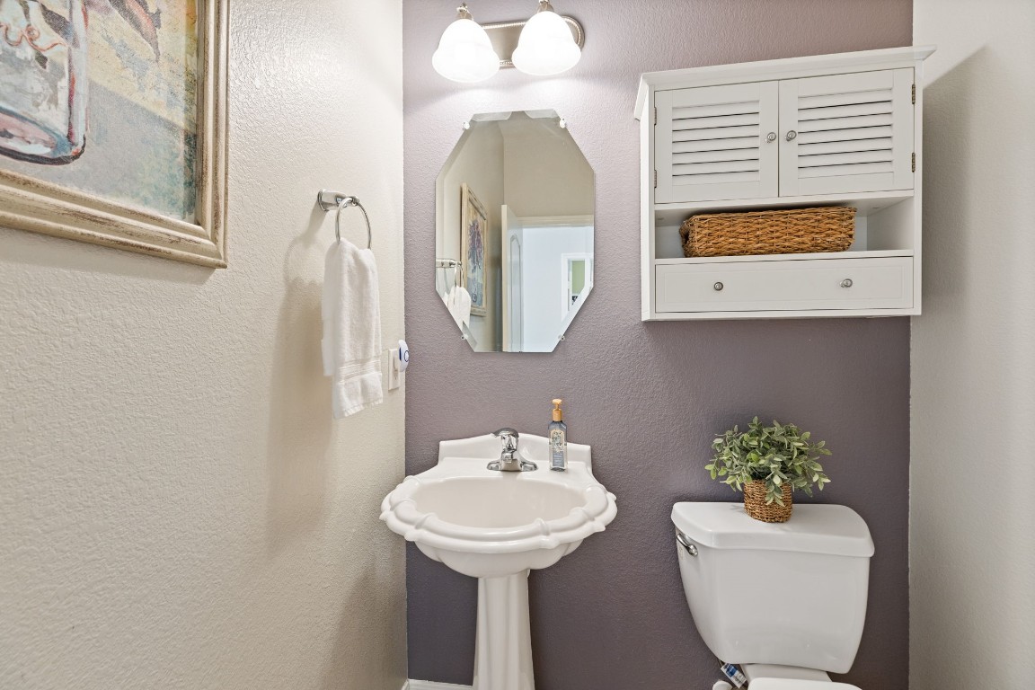 5318 Wisteria Brook Lane Spring, TX 77379 - Photo 33 of 50 a bathroom with a sink and a mirror