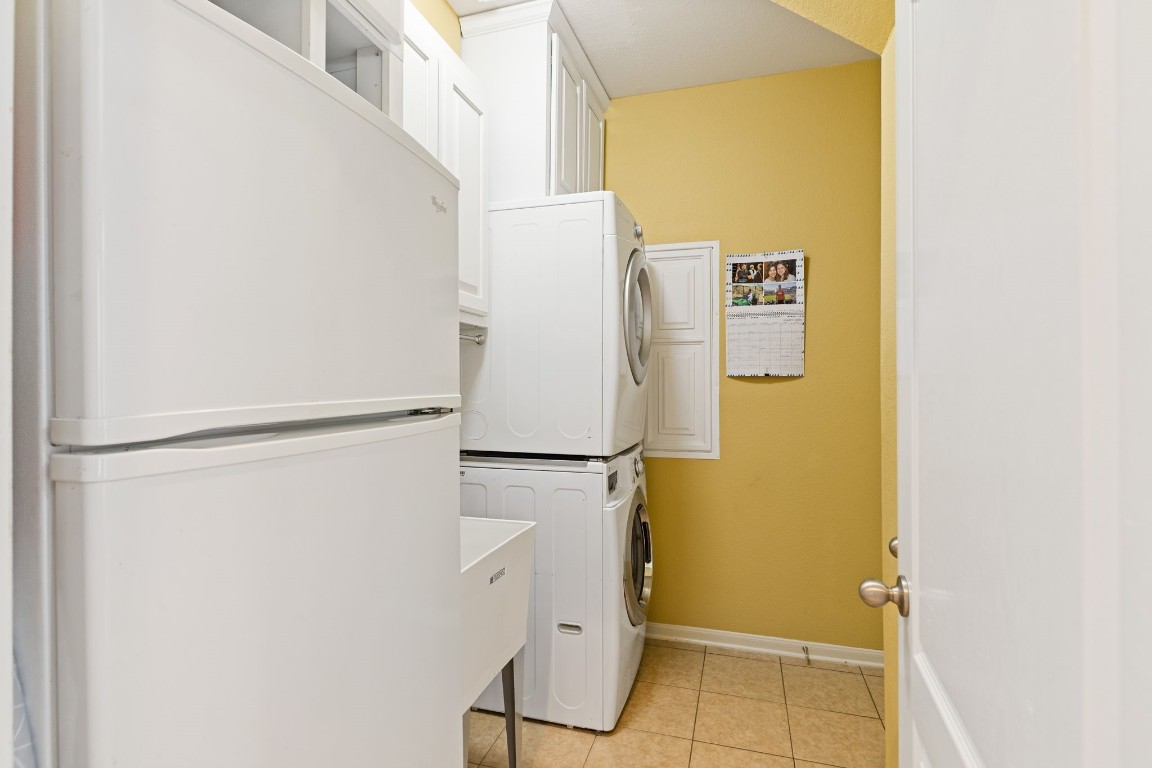 5318 Wisteria Brook Lane Spring, TX 77379 - Photo 34 of 50 a view of a storage & utility room with refrigerator
