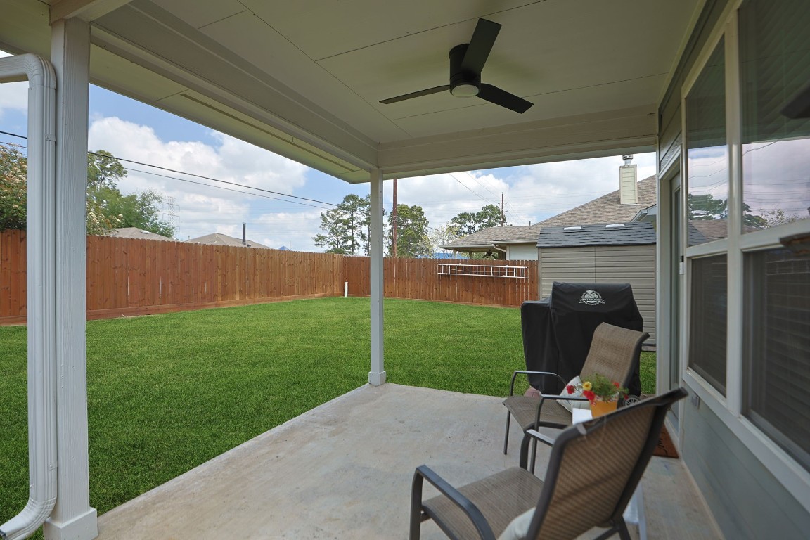 5318 Wisteria Brook Lane Spring, TX 77379 - Photo 36 of 50 a view of backyard with furniture and garden