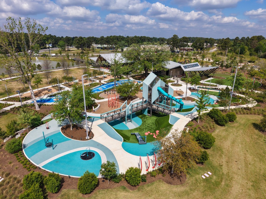 5318 Wisteria Brook Lane Spring, TX 77379 - Photo 45 of 50 an aerial view of residential houses with outdoor space and swimming pool