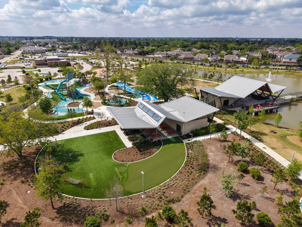 5318 Wisteria Brook Lane Spring, TX 77379 - Photo 46 of 50 an aerial view of a residential houses with outdoor space and lake view in back