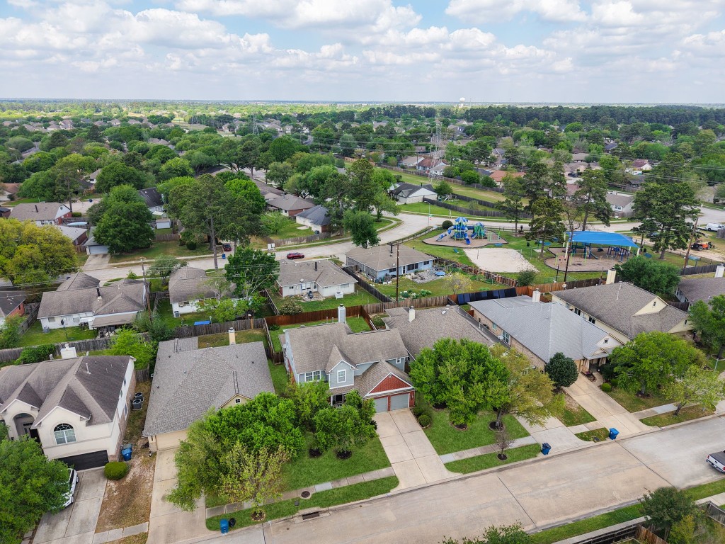 5318 Wisteria Brook Lane Spring, TX 77379 - Photo 48 of 50 a view of a city with green space and car parked
