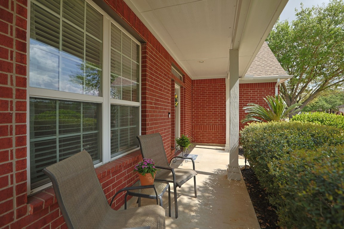 5318 Wisteria Brook Lane Spring, TX 77379 - Photo 6 of 50 a view of balcony with a potted plant and outdoor seating