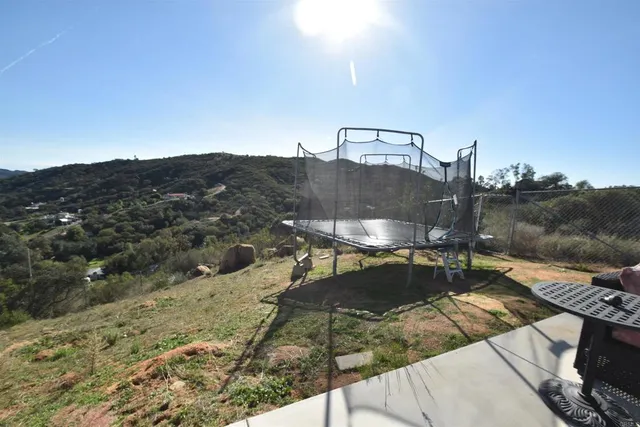 a view of balcony with furniture