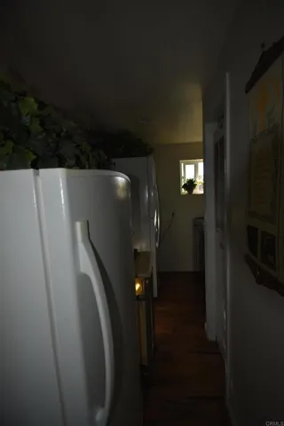 a bed room with a bed and a television