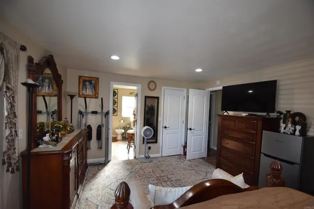 a bathroom with a toilet a sink and a shower