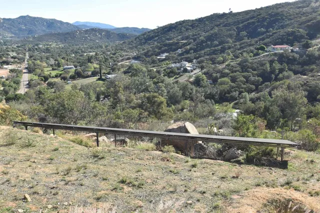 a view of a roof with a mountain in the background