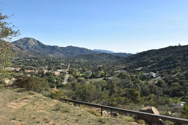 a view of a mountain from a balcony