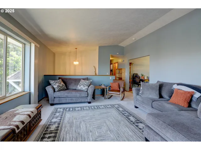 a living room with furniture and a couch