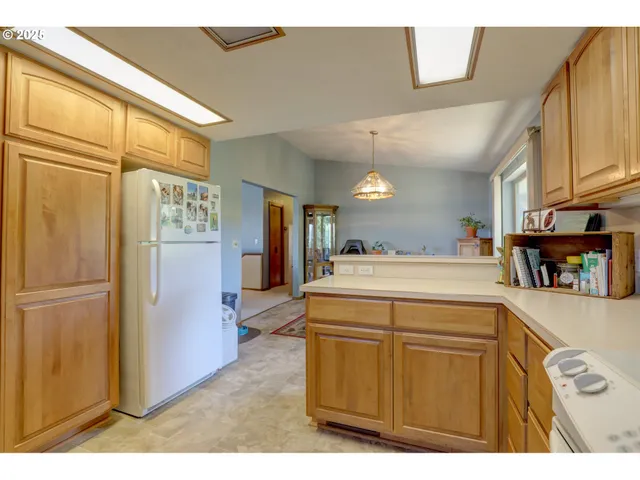 a utility room with closet dryer and washer