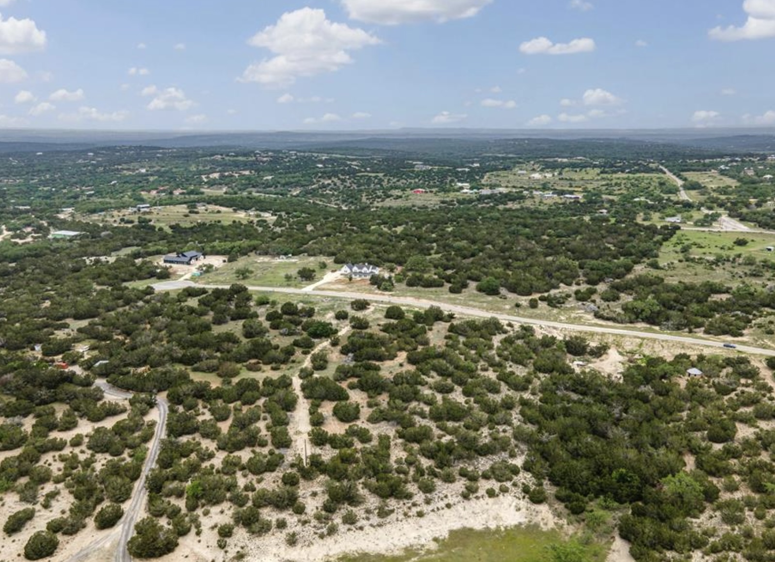 439 Vail River Road Dripping Springs, TX 78620 - Photo 16 of 20 a view of city with tall buildings