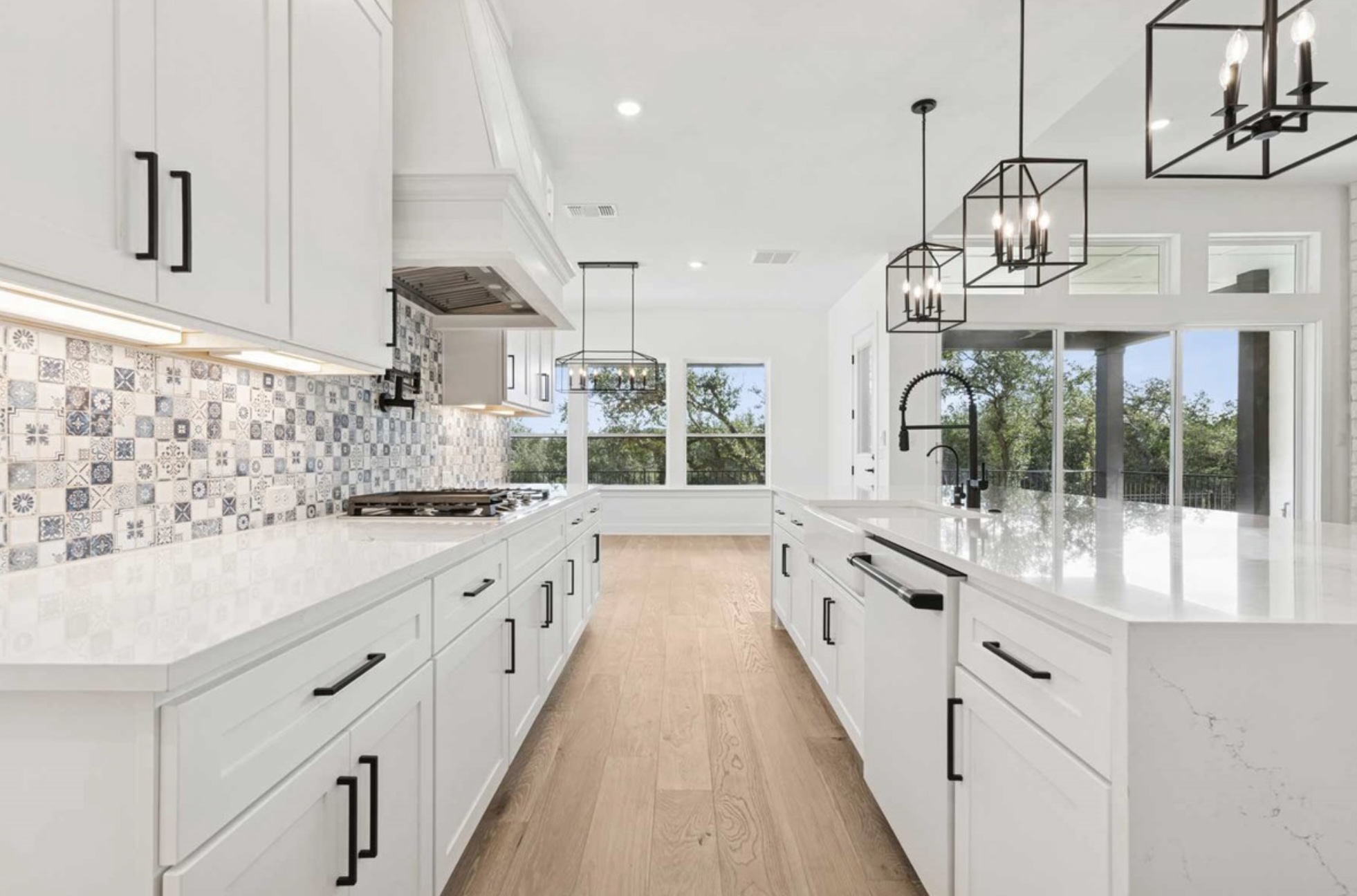 439 Vail River Road Dripping Springs, TX 78620 - Photo 4 of 20 a large white kitchen with a large window