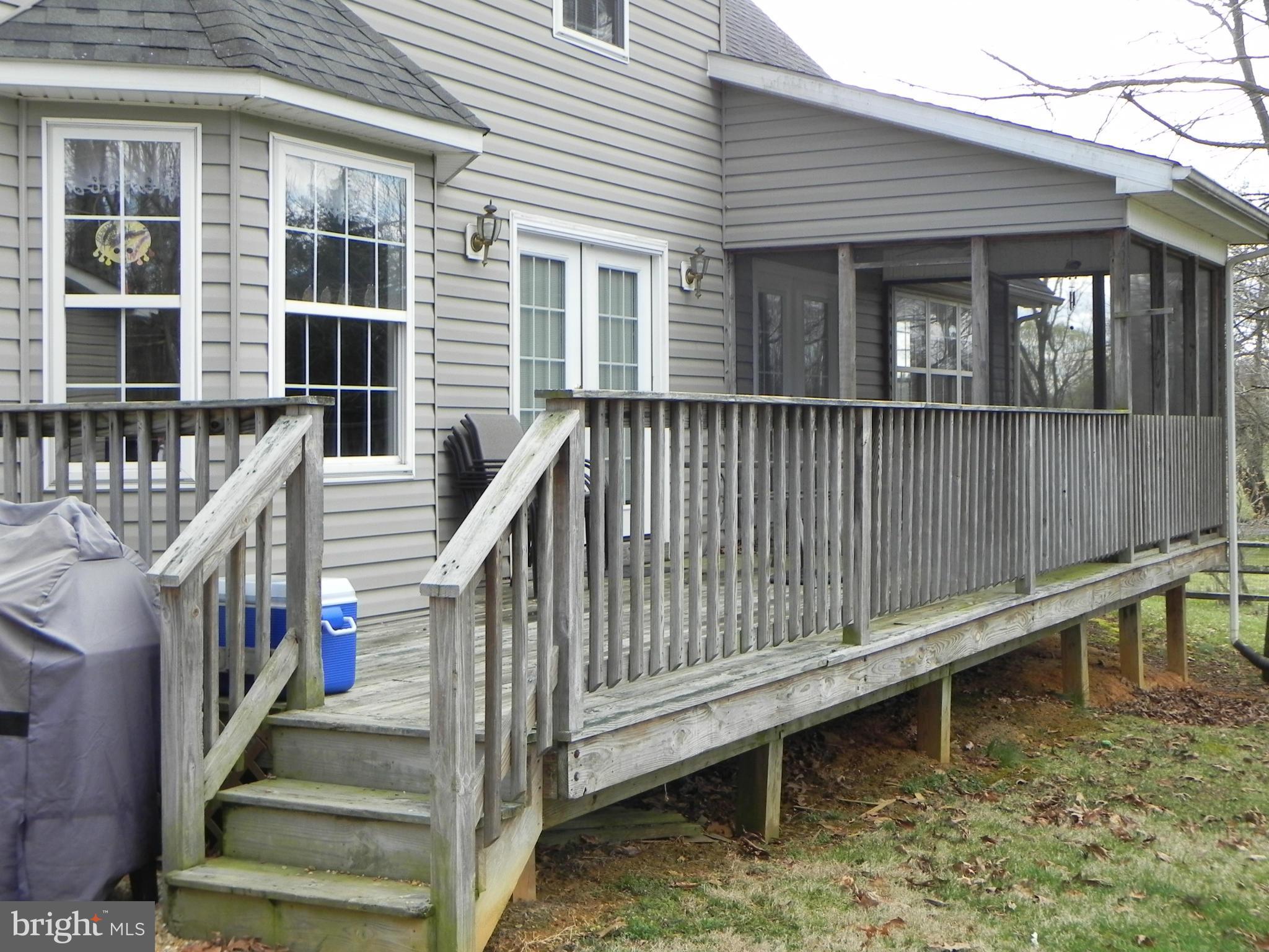 451 Quail Run Road Summit Point, WV 25446 - Photo 27 of 30 DECK & SCREENED PORCH