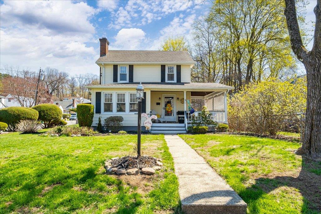 a front view of a house with swimming pool